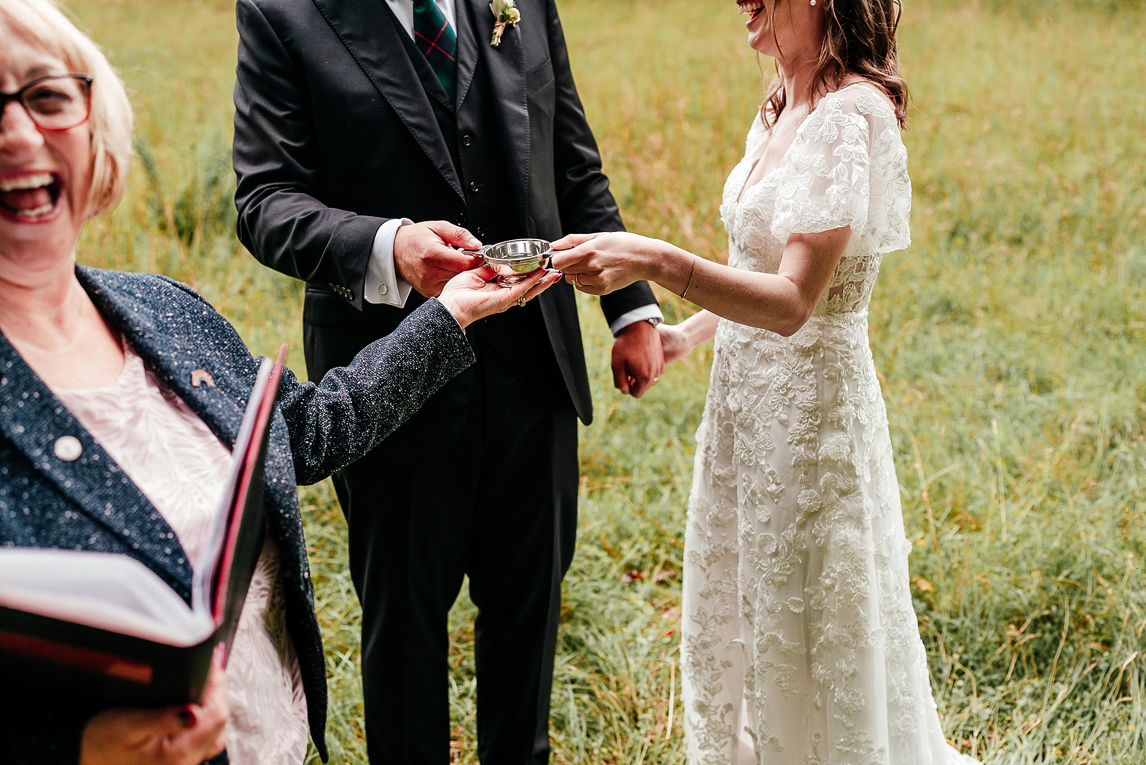 wedding traditions scotland humanist ceremony with quaich which is a cup of whisky shared between the bride groom couple